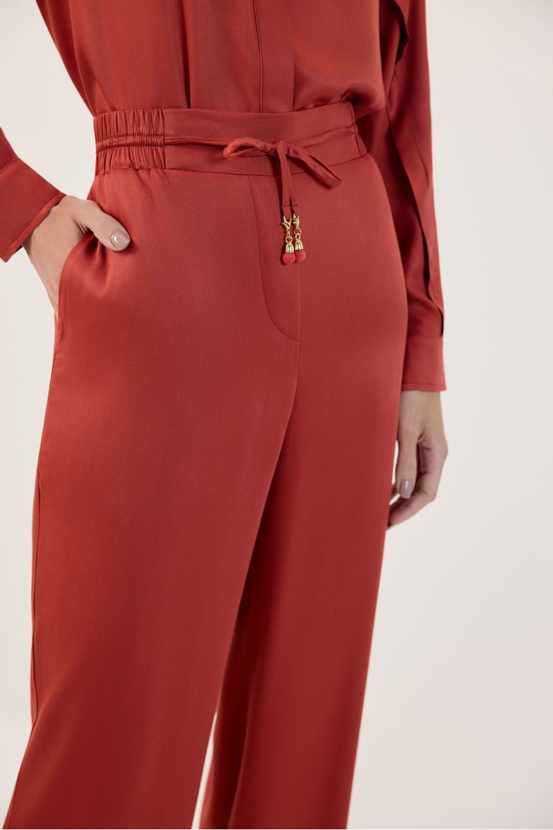 Calça cós elástico bolso telha