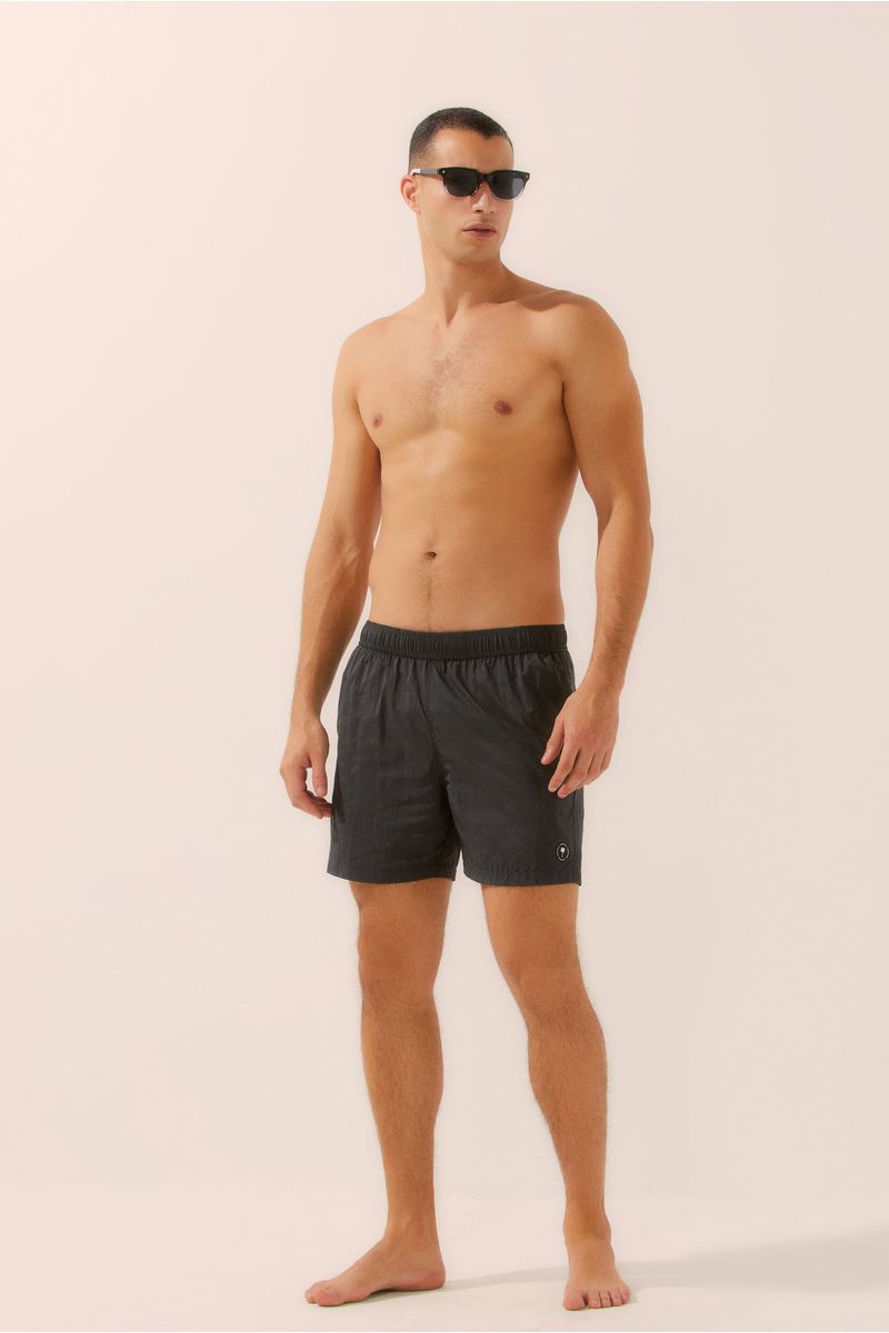 Short Praia Folhagens Anoitecer